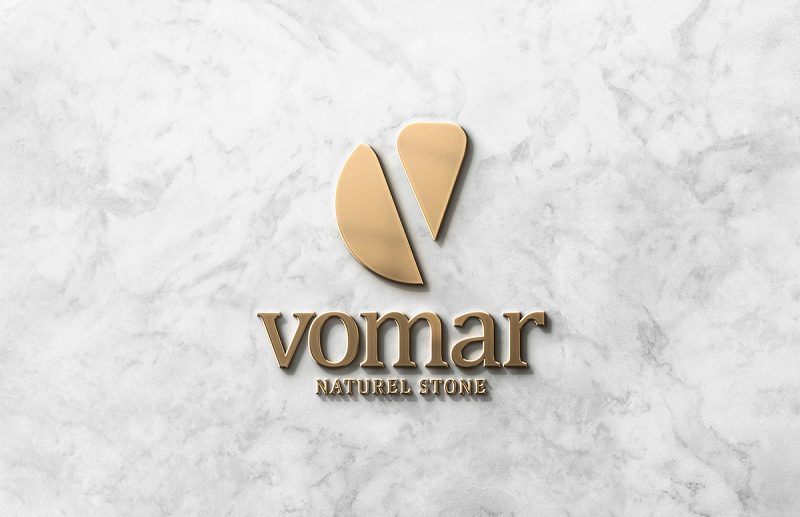 Vomar logosu, mermer yüzey üzerinde